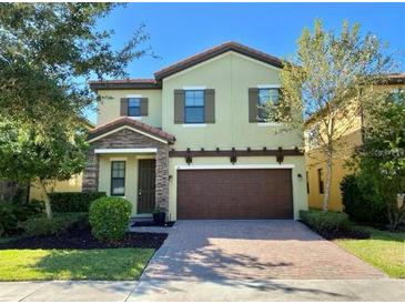 Charming two-story home with a well-maintained lawn and a two-car garage at 191 Chickasaw Berry Rd, Ocoee, FL 34761