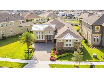 Beautiful single-story home with well manicured landscaping and a paved driveway at 12334 Upper Harden Ave, Orlando, FL 32827
