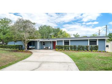 Charming one-story home with a well-manicured lawn and inviting curb appeal at 2707 Prince John Rd, Winter Park, FL 32792