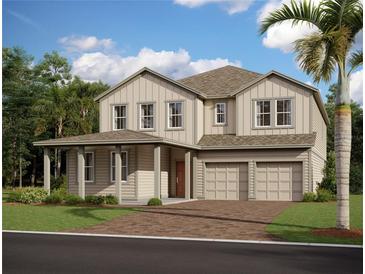 Charming two-story home featuring a welcoming front porch and a two-car garage at 22117 Amberbush Court, Mount Dora, FL 32757