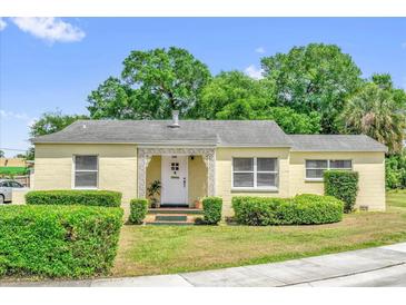 Charming single-story home with well-maintained landscaping and a decorative entryway at 320 Granada Dr, Winter Park, FL 32789
