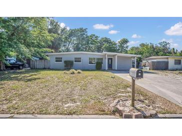 Charming single-story home with tidy landscaping, neutral paint, and a welcoming entrance at 132 W Lauren Ct, Casselberry, FL 32730