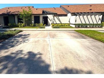 Charming single-story home featuring a private two-car driveway and well-maintained landscaping at 2348 Sun Valley Cir, Winter Park, FL 32792