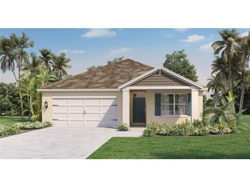Charming single-Gathering home with a two-car garage, landscaped yard, and inviting front entry at 1019 Morfontaine St, Daytona Beach, FL 32124