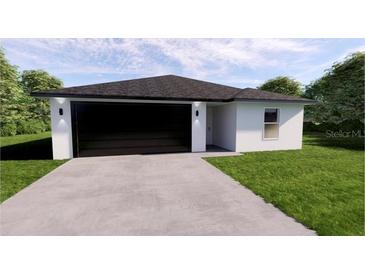 Charming single-story home with a modern design and a spacious two-car garage at 17445 Sw 25Th Ct, Ocala, FL 34473