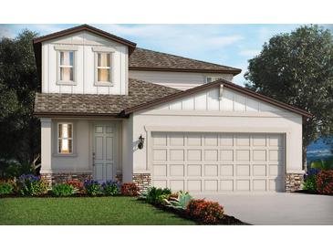 Charming two-story home features a well-manicured lawn and an attached two-car garage at 2790 Virginia Pine Dr, Bartow, FL 33830