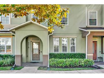 Inviting townhome with a covered entryway and well-maintained landscaping in a desirable community at 6218 Forsythe Loop, Sanford, FL 32771