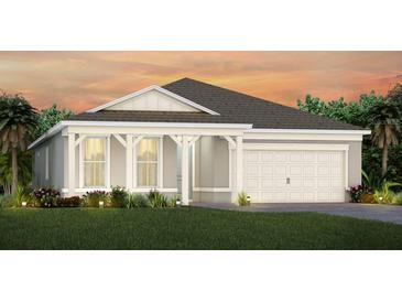 Charming single-Gathering home with a two-car garage and well-manicured lawn at 1938 Spring Shower Cir, Kissimmee, FL 34744