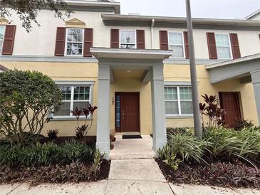Charming two-story home featuring a well-manicured lawn and inviting front entrance at 8271 Maritime Flag St # 125, Windermere, FL 34786