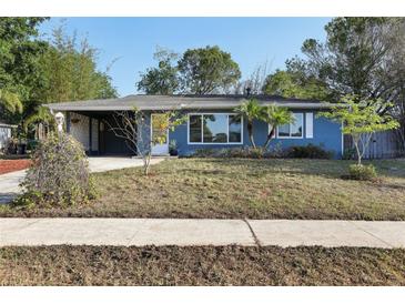 Charming single-story home with well-maintained lawn and mature trees at 1656 Brentlawn St, Deltona, FL 32725