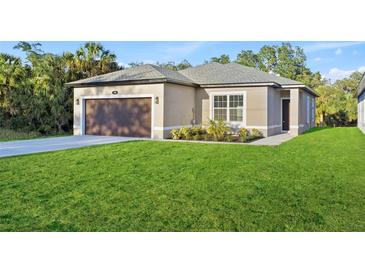 Charming single-story home featuring a well-maintained lawn and neutral-colored exterior at 104 Alta Vista Way, Davenport, FL 33837