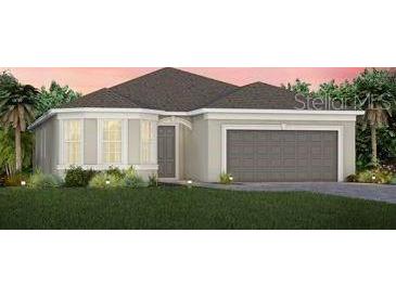 Charming single-Gathering home with a well-manicured lawn and attached two-car garage at 2729 Serenity Meadow Dr, Kissimmee, FL 34744