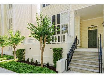Charming home exterior featuring a well-maintained front yard and inviting entrance at 478 Water St, Kissimmee, FL 34747