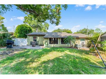 Spacious back yard with mature trees and shade for outdoor enjoyment at 3601 Midiron Dr, Winter Park, FL 32789