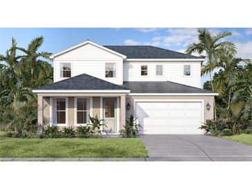 Inviting two-story home featuring a modern white facade, covered entryway, and a two-car garage at 30269 Rustic Mill St, Mount Dora, FL 32757