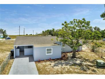 Charming single-story home with a well-maintained yard and private driveway, ideal for comfortable living at 7 Garvey Ln, Frostproof, FL 33843