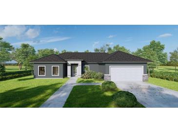 Charming single-story home featuring a modern gray facade, well-maintained lawn and two car garage at 6168 Sw 154Th St, Ocala, FL 34473