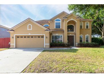 Charming two-story home featuring a two-car garage and well-maintained lawn in a desirable neighborhood at 2780 Running Springs Loop, Oviedo, FL 32765