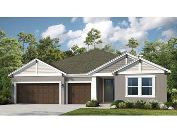 Charming single-Gathering home with a two-car garage, well-manicured lawn, and inviting curb appeal at 857 Junonia Blvd, New Smyrna Beach, FL 32168
