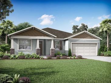 Charming single-story home featuring craftsman-style details, a two-car garage, and a well-manicured lawn at 13255 Pergola Ave, Orlando, FL 32832