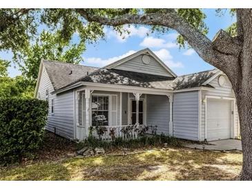 Charming single-story home featuring a cozy front porch, well-manicured lawn, and attached one car garage at 1527 Braewick St, Winter Springs, FL 32708