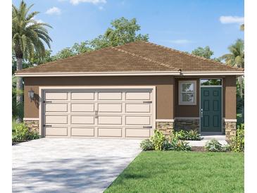 Charming single-story home featuring a two-car garage, dark green front door, and well-manicured landscaping at 4618 Barberry Ave, Lakeland, FL 33811
