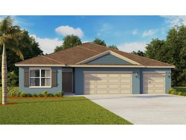 Charming single-Gathering home showcasing a large front-facing two car garage and inviting front yard at 1375 Scarlett Sage Ln, Sanford, FL 32773