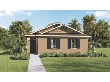 Charming single-story home with a well-manicured lawn and tropical landscaping including mature palm trees at 5282 Scrub Mint Ln, Apopka, FL 32712