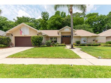 Charming single-story home with well-manicured lawn and inviting curb appeal at 812 Silverwood Dr, Lake Mary, FL 32746