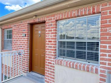 Charming brick condo with a private entrance, offering a cozy and inviting curb appeal at 2426 Branch Way # 200, Maitland, FL 32751