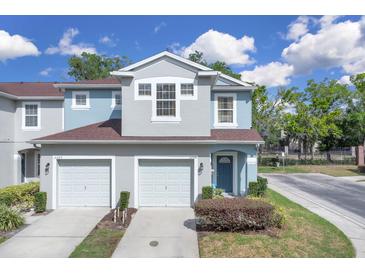 Charming two-story townhome with attached garage and well-maintained landscaping at 2288 Leland Ln, Casselberry, FL 32707