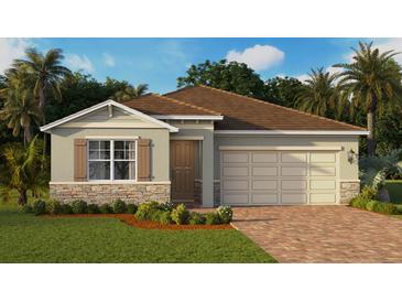 Charming single-story home featuring stone accents, a two-car garage, manicured lawn, and tropical landscaping at 3974 Kennebunk Loop, Mount Dora, FL 32757