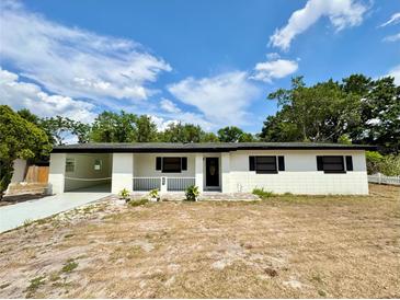 Charming single-story home with a well-maintained exterior and front porch at 2007 N Hastings St, Orlando, FL 32808