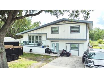 Charming two-story home with a modern exterior and well-maintained landscaping at 2932 Larson St, Kissimmee, FL 34741
