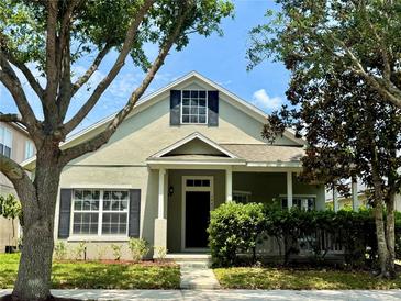 Charming single-Gathering home featuring mature trees and lush landscaping at 14479 Tanja King Blvd, Orlando, FL 32828