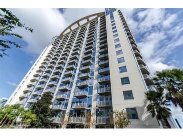 Modern high-rise condo building with balconies and a view of the city skyline at 155 S Court Ave # 2406, Orlando, FL 32801