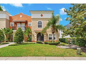 Charming two-story townhouse with well-manicured lawn and mature landscaping at 1745 Indiana Ave # J, Winter Park, FL 32789
