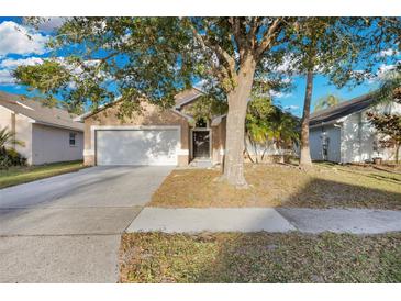 Charming single-Gathering home with a spacious driveway and mature trees at 2643 Alamosa Pl, Lake Mary, FL 32746