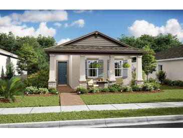 Charming single-story home with a welcoming front porch, beautiful landscaping, and blue accent shutters at 15120 Field Daisy Dr # 204, Winter Garden, FL 34787