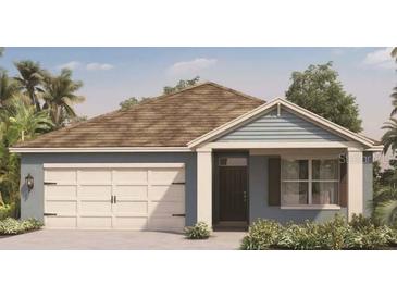 Charming single-story home featuring a two-car garage and a beautifully landscaped front yard at 215 Taylor Groves St, Lake Wales, FL 33898