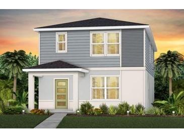 Charming two-story home with gray siding, white trim, and well-manicured landscaping at 6951 Copperwood Ave, Orlando, FL 32829
