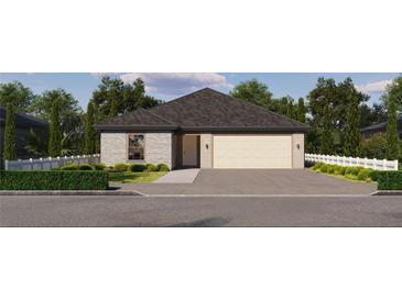 Charming single-story home with stone and traditional siding, a two-car garage and manicured landscaping at 163 Jessamine Ln, Lady Lake, FL 32159