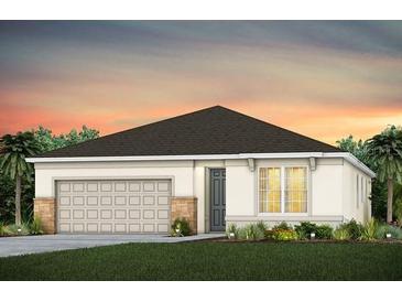 Charming single-story home featuring a two-car garage and well-maintained landscaping at 2291 Mossy Vine Ave, St Cloud, FL 34771