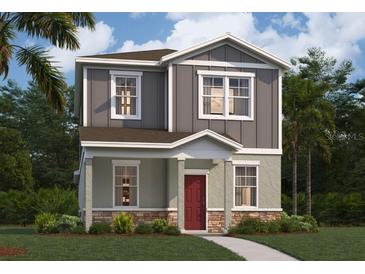 Charming two-story home featuring stone accents, neutral siding and inviting front porch at 502 Belmond Dr, Debary, FL 32713