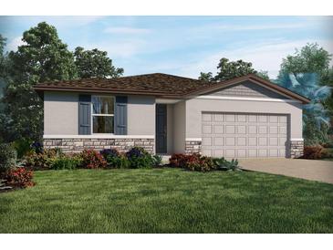 Inviting single-Gathering home featuring neutral paint, a well-kept lawn, and charming stone accents at 1122 Cumberland Trail Dr, Lake Hamilton, FL 33851