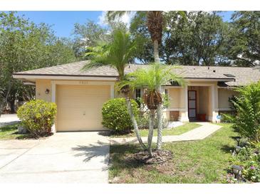 Charming single-story home with a well-maintained lawn and inviting curb appeal, offering a welcoming atmosphere at 4035 Palo Alto Ct, Orlando, FL 32817