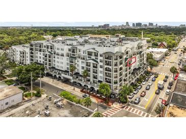 Stunning aerial view of condo building featuring stylish balconies and a convenient location at 2305 Edgewater Dr # 1509, Orlando, FL 32804
