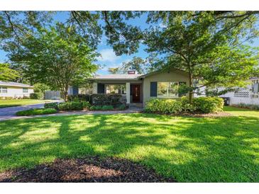 Charming home with mature landscaping and a welcoming front porch at 927 Boardman St, Orlando, FL 32804