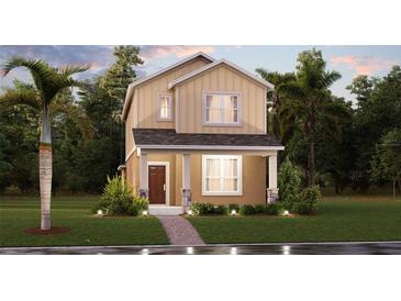 Charming two-story home featuring a cozy front porch and well-maintained landscaping at 2441 Spring Tune Aly, Kissimmee, FL 34744