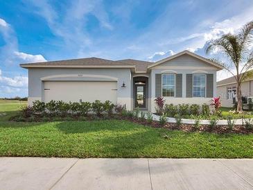 Charming single-Gathering home with well-manicured lawn and attractive landscaping at 3326 Arch Ave, Ormond Beach, FL 32174